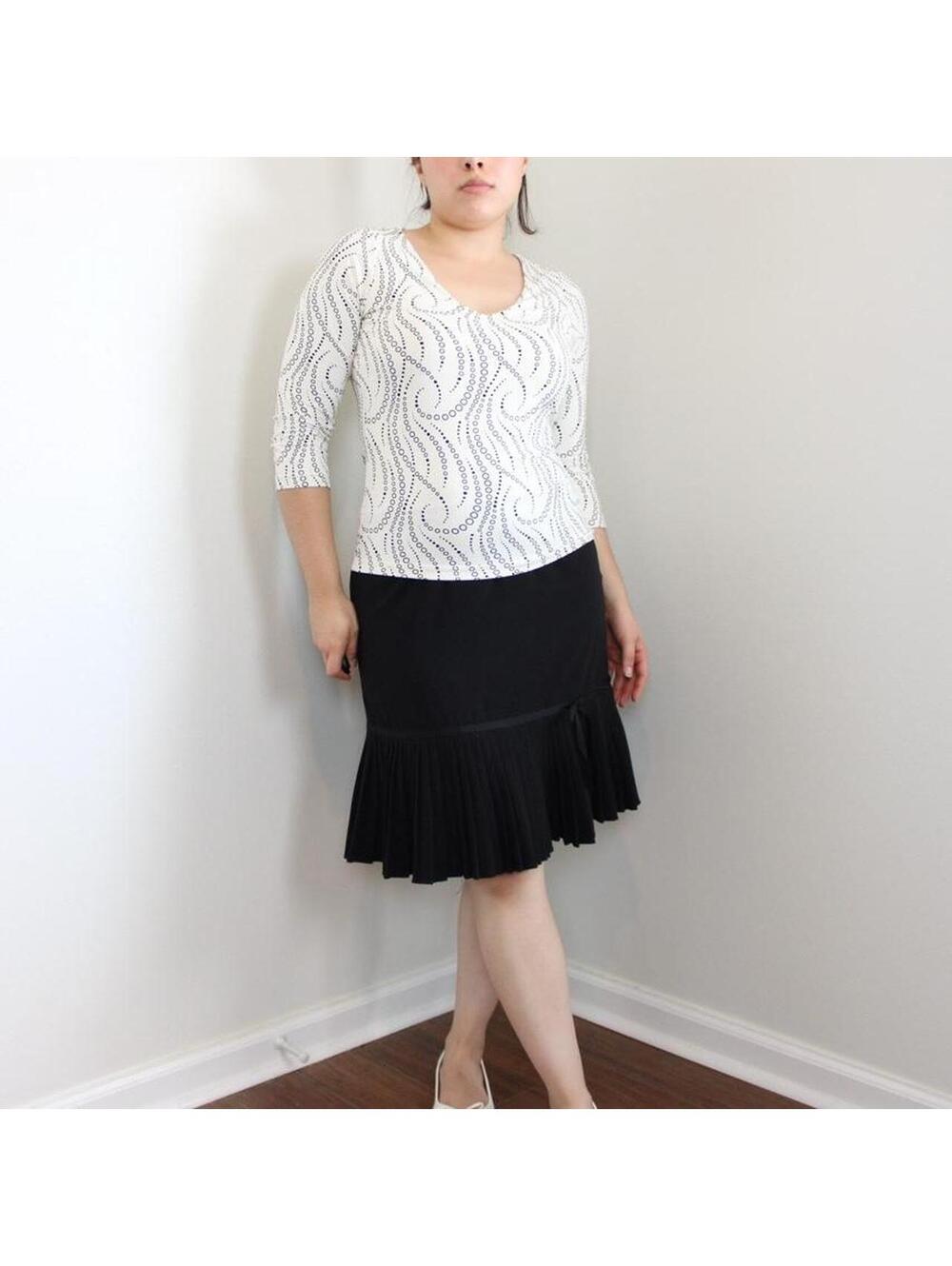 Vintage Larry Lavine Black pleated midi skirt with ruffle hem. Size 8